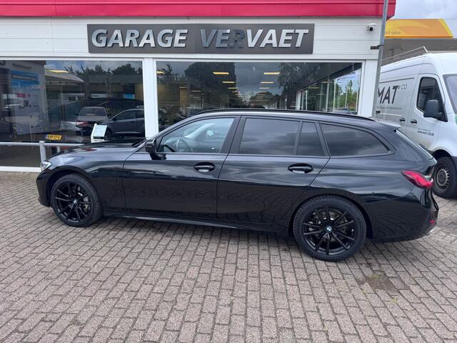 BMW 3-SERIE Touring 330e High Executive