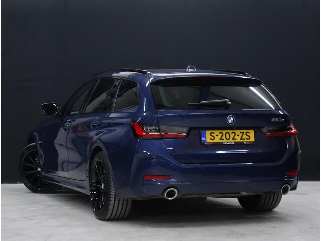 BMW 3-SERIE Touring 320e FACELIFT [TREKHAAK UITKLAPBAAR, SOH: 94%, APPLE CARPLAY, ELEKTRISCH VERSTELBARE STOELEN, CAMERA, PDC V+A, VOL LEDER, LED, CRUISE CONTROL, NIEUWSTAAT]