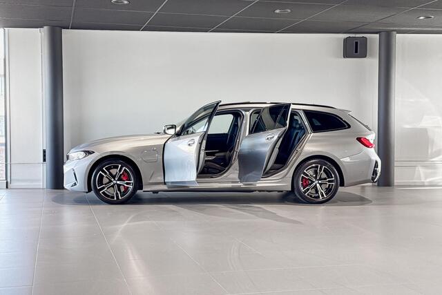 BMW 3-SERIE Touring 330e | M Sport Pro | Glazen Panoramadak | Stoelverwarming | Trekhaak |