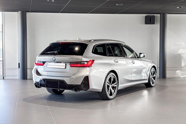 BMW 3-SERIE Touring 330e | M Sport Pro | Glazen Panoramadak | Stoelverwarming | Trekhaak |