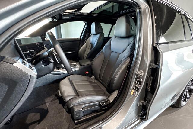 BMW 3-SERIE Touring 330e | M Sport Pro | Glazen Panoramadak | Stoelverwarming | Trekhaak |