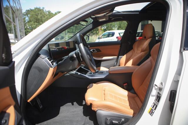 BMW 3-SERIE Touring 330e xDrive | M Sport | M3 stoelen | Pano | HUD | Trekhaak | H&K