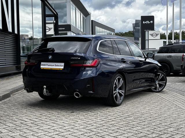 BMW 3-SERIE 320e M Sportpakket | Comfort Pack | Trekhaak met elektrisch wegklapbare kogel | Glazen panoramadak | HIFI System Harman Kardon | Stuurwielrand verwarmd |