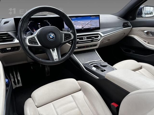 BMW 3-SERIE 320e M Sportpakket | Comfort Pack | Trekhaak met elektrisch wegklapbare kogel | Glazen panoramadak | HIFI System Harman Kardon | Stuurwielrand verwarmd |