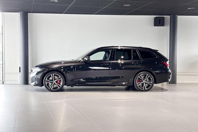 BMW 3-SERIE Touring 330e | M Sport Pro | Glazen Panoramadak | Stoelverwarming | Achteruitrijcamera | Trekhaak |