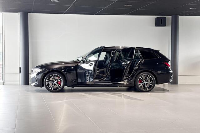 BMW 3-SERIE Touring 330e | M Sport Pro | Glazen Panoramadak | Stoelverwarming | Achteruitrijcamera | Trekhaak |