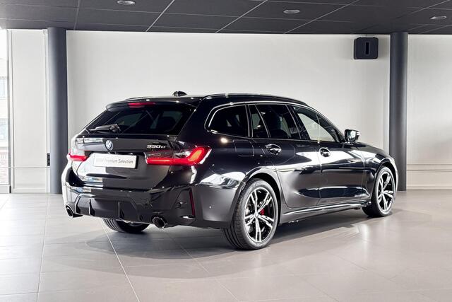BMW 3-SERIE Touring 330e | M Sport Pro | Glazen Panoramadak | Stoelverwarming | Achteruitrijcamera | Trekhaak |