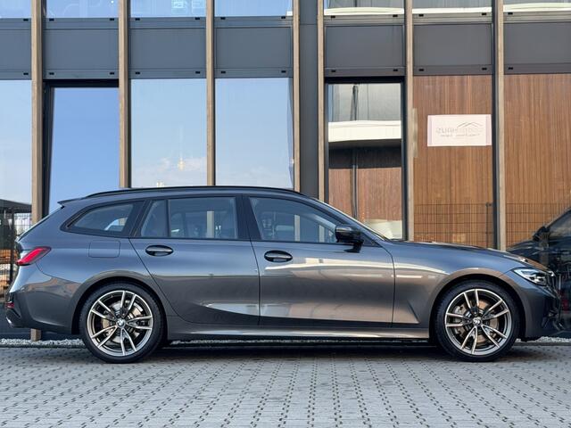 BMW 3-SERIE Touring 330i | Driving assistant | Sfeer-verlichting | 19 inch | Sport-s