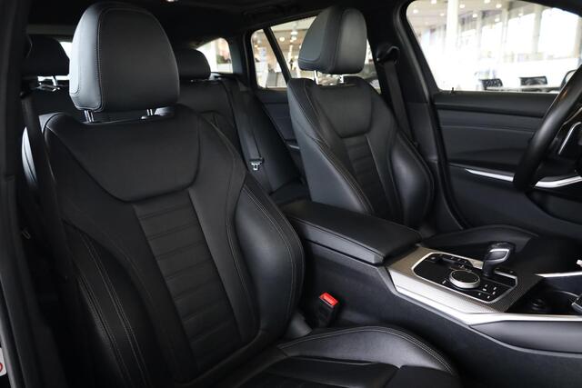BMW 3-SERIE Touring 318i High Executive | M sportpakket | Parking Pack | Glazen panoramadak | Parking Assistant | Lentevoordeel