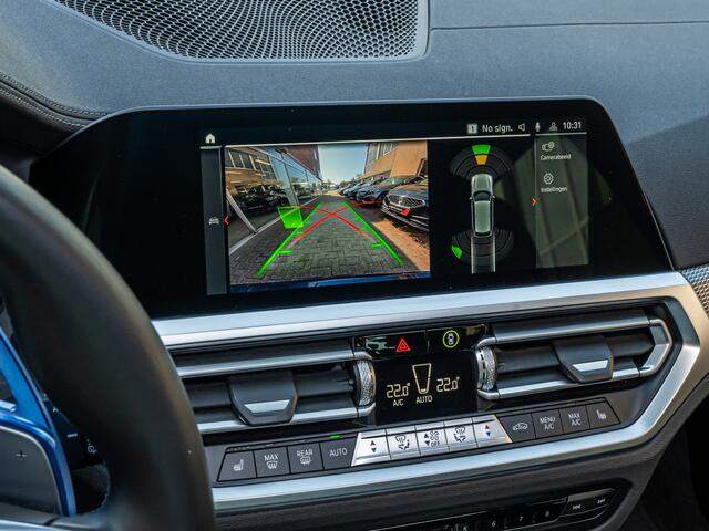 BMW 3-SERIE Touring 330e xDrive High Exe M-Sport PANO LASER HARMAN KARDON HUD CAMERA 19 INCH BOMVOL!!