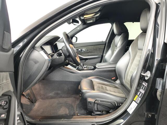BMW 3-SERIE Touring 330e High Executive | Trekhaak | Stoelverwarming | Adaptive Cruise Control | Elektrische Achterklep |