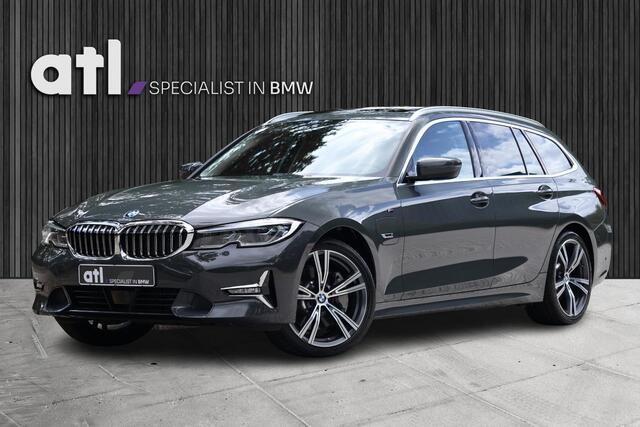 BMW 3-SERIE Touring 330e xDrive High Executive Luxury Line | Pano | Adap Cruise | HUD | Memory | 19 "| Laser | Hifi | Camera | Keyless | Adaptief M onderstel | Stoelverwarming voor & achter | Etc.