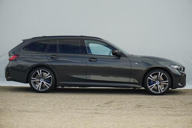 BMW 3-SERIE Touring 320e | M Sportpakket Pro | Panoramadak | Harman Kardon | Elektrisch verstelbare stoelen | Comfort Access