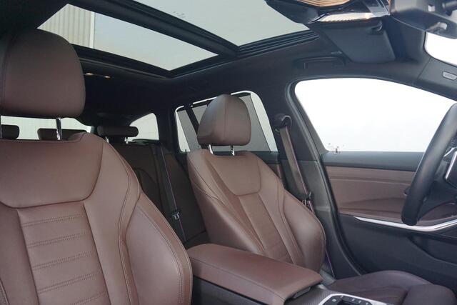 BMW 3-SERIE Touring 320e | M Sportpakket Pro | Panoramadak | Harman Kardon | Elektrisch verstelbare stoelen | Comfort Access