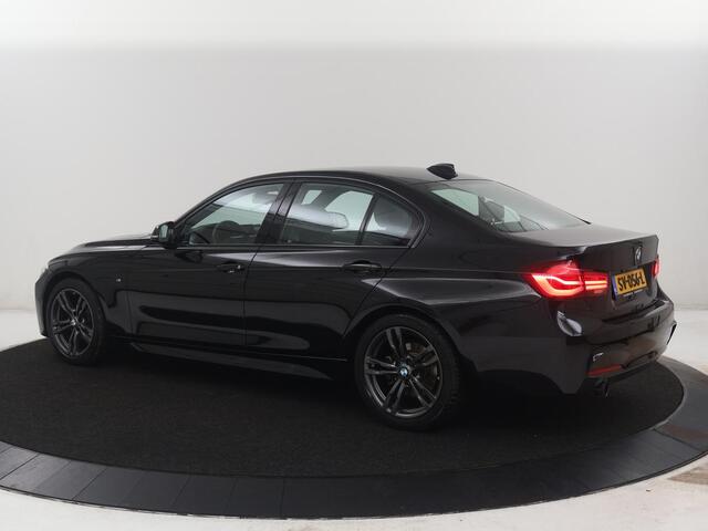 BMW 3-SERIE 318i Edition M Sport Shadow Executive | Leder | Stoelverwarming | Cruise control | Navigatie | Park assist | Climate control
