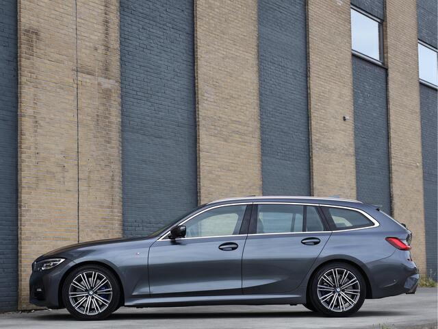 BMW 3-SERIE Touring 330i M Sport Pano | HUD | Leder | ACC | Trekhaak | Memory