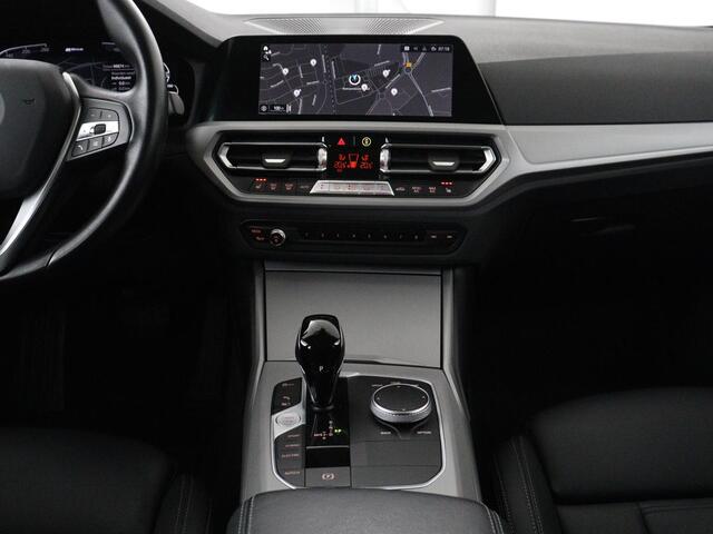 BMW 3-SERIE Touring 320e Business Edition Plus | SOH 90% | Leder | Stoelverwarming | Carplay | Cruise control | Climate control | Elektrische achterklep | Park assist | PHEV