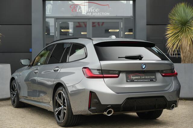 BMW 3-SERIE Touring 330e xDrive M Sport High Executive 292pk Navigatie/HUD/360Camera