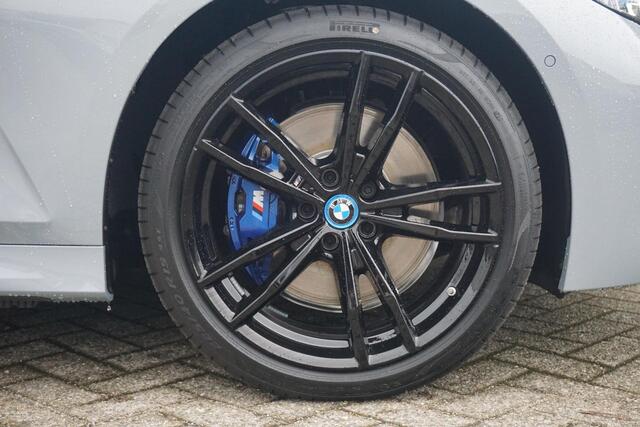 BMW 3-SERIE Touring 320e | M Sportpakket Pro | Panoramadak | Trekhaak | Comfort Acces