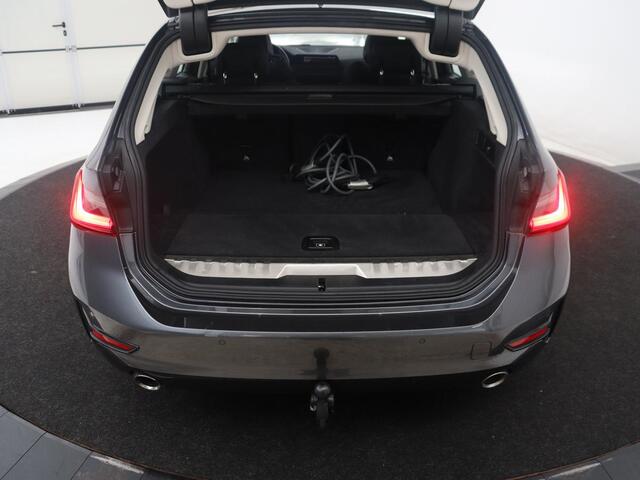 BMW 3-SERIE Touring 320e Business Edition Plus | SOH 84,2% | Leder | Cruise control | Stoelverwarming | Climate control | 3 zone klimaat | Navigatie | Bluetooth | Elektrische achterklep | Trekhaak