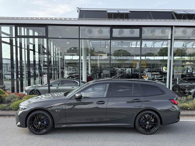 BMW 3-SERIE Touring 330e xDrive 292pk M-Sport+Pro Schaalstoelen Dravit Pano Trekhaak 19-inch