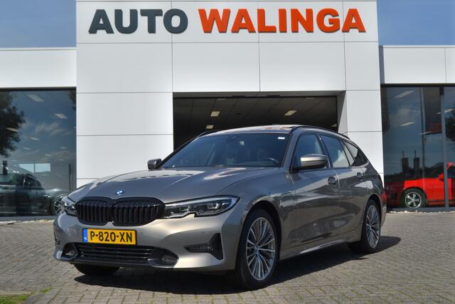 BMW 3-SERIE Touring Panoramadak | Leer | Sportstoelen | Trekhaak | Carplay | 320e Business Edition Plus