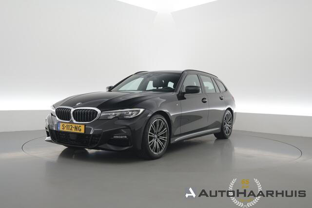 BMW 3-SERIE Touring 320i M Sport | Rijklaar! | Dig. Cockpit | Stoelverw. | Adapt. Cruise | PDC | Nav+App.Connect | Sfeerverl. | Climate | E-Klep | LED | 18'' V