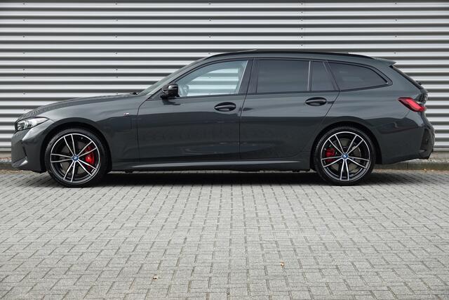BMW 3-SERIE Touring 330e M-Sport Pro | Panodak | Trekhaak | H&K | HUD | Carbon | Memory | ACC |