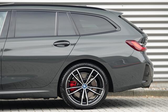 BMW 3-SERIE Touring 330e M-Sport Pro | Panodak | Trekhaak | H&K | HUD | Carbon | Memory | ACC |
