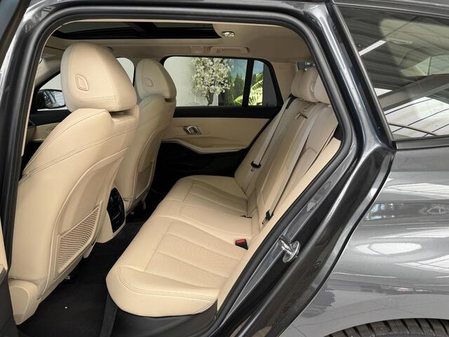 BMW 3-SERIE Touring 330e Business Edition Plus | Leder | Achteruitrijcamera | Panoramadak | Stoelverwarming |