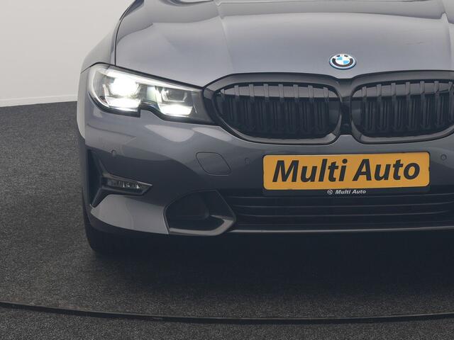 BMW 3-SERIE Touring 330e Sportline PHEV 293pk Dealer O.H | Trekhaak Af Fabriek | Camera | Cruise Control | Lederen Sportstoelen Verwarmd | Apple Carplay | Virtual | Navigatie | Sfeerverlichting | DAB | 17"L.M |