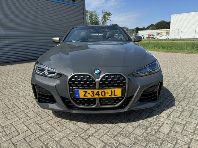 BMW 4-SERIE Cabrio M440i 374PK xDrive High Executive M Sport Nekverwarming 19 Inch DAB LED Stuurverwarming Harman-Kardon Stuurverwarming 360 graden Camera Head-Up Display Keyless Entry Laser Licht ACC Dravit Grau Carplay Vol!