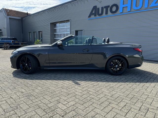 BMW 4-SERIE Cabrio M440i 374PK xDrive High Executive M Sport Nekverwarming 19 Inch DAB LED Stuurverwarming Harman-Kardon Stuurverwarming 360 graden Camera Head-Up Display Keyless Entry Laser Licht ACC Dravit Grau Carplay Vol!