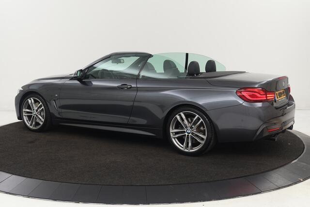BMW 4-SERIE Cabrio 440i M Sport | Stoel & stuurverwarming | Head-Up | Leder | Camera | Nekverwarming | Trekhaak | Harman/Kardon | Adaptief LED | Keyless | Navigatie