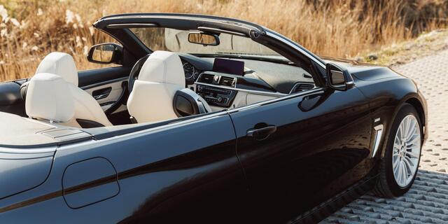 BMW 4-SERIE Cabrio 420i High Executive / Automaat / NL-Auto / 184 PK / Dealer-Onderhouden / Vol-Leder / Stoelverwarming / Nekverwarming / Elektr.- Stoelen met Geheugen / Cruise-Control / Climate-Control / Dodehoek-Detectie / LED / Radio-Bluetooth / Navi / Elektr.-Ach