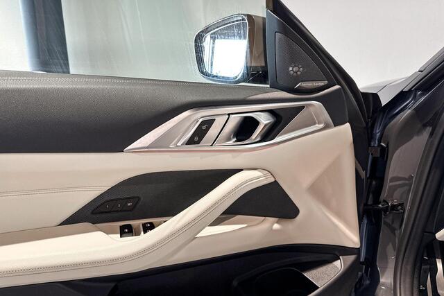 BMW 4-SERIE Cabrio M440i xDrive High Executive | M Performance velgen | Harman Kardon | Stoelverwarming |