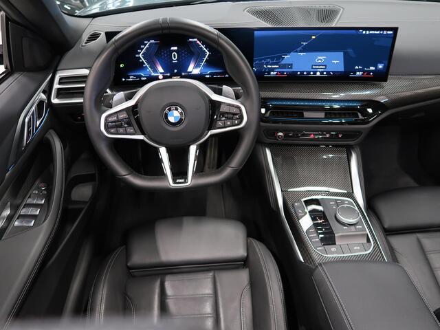 BMW 4-SERIE Cabrio 420i High Executive M-Sport Sportstoelen Camera Stoelverwarming Curved dashboard Navigatie Airco-ecc 19 inch Sportvelgen App connect Cape York Green metallic Zwart sportleer