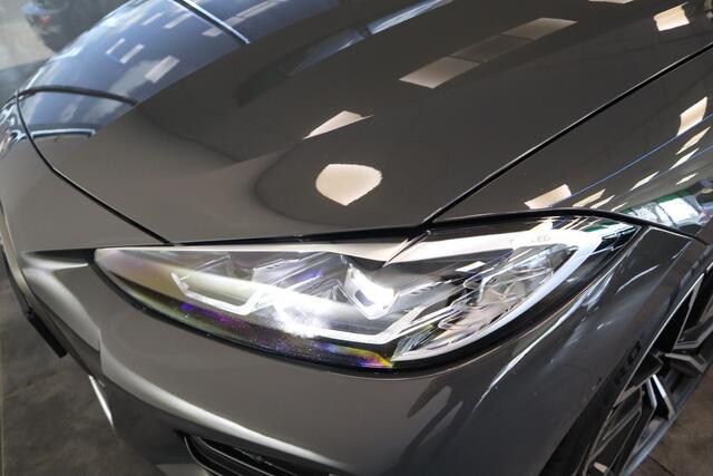 BMW 4-SERIE Cabrio M440i xDrive High-Executive 374PK Individueel-lak Navigatie Volleder 19LMV Head up