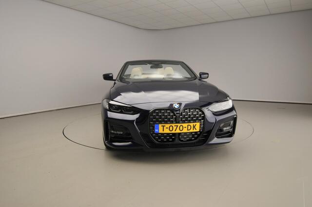 BMW 4-SERIE Cabrio 420i | M-Sportpakket | LED | Leder | HUD | Sportstoelen | Active cruise | Trekhaak | Windscherm | DAB | Harman-kardon sound | Alu 19 inch