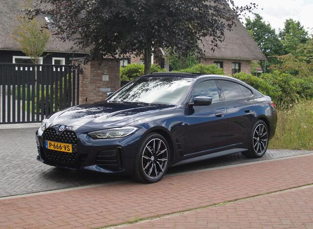 BMW 4-SERIE Gran Coupé 420i Business Edition Plus | M-Pakket | Panoramadak | Camera | Sfeerverlichting | Leer |