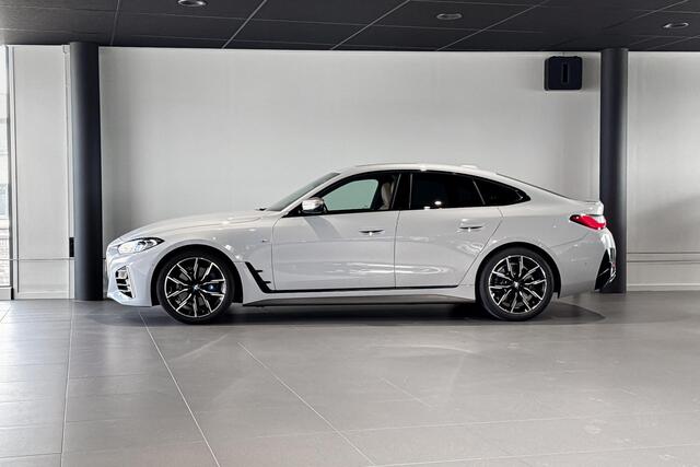 BMW 4-SERIE Gran Coupé M440i xDrive High Executive | M Sport | Glazen Schuif-/kanteldak | Stoelverwarming | Head-Up Display |