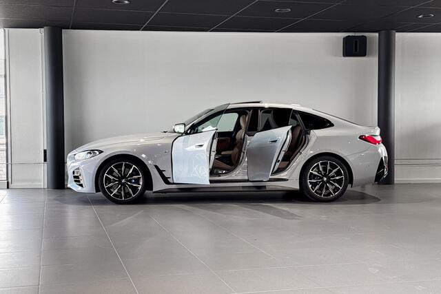 BMW 4-SERIE Gran Coupé M440i xDrive High Executive | M Sport | Glazen Schuif-/kanteldak | Stoelverwarming | Head-Up Display |
