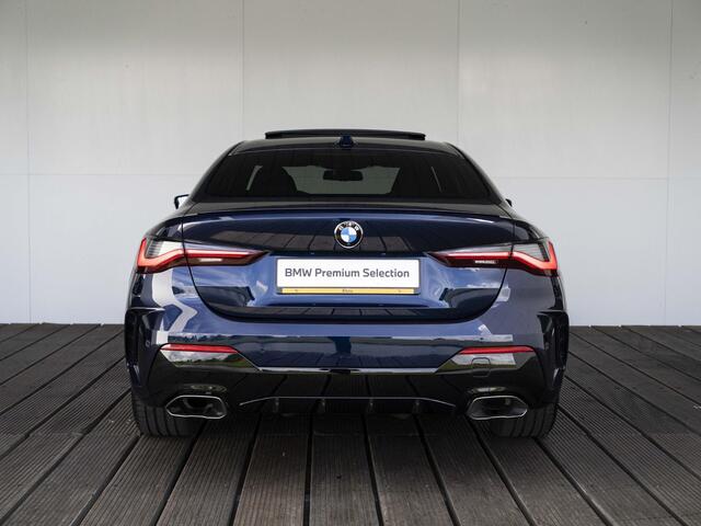 BMW 4-SERIE Coupé M440i xDrive | High Executive | M Sportpakket | 19 inch | Adaptief M Onderstel | Glazen schuif-/kanteldak | Driving Assistent Professional | BMW Laserlight | Harman Kardon