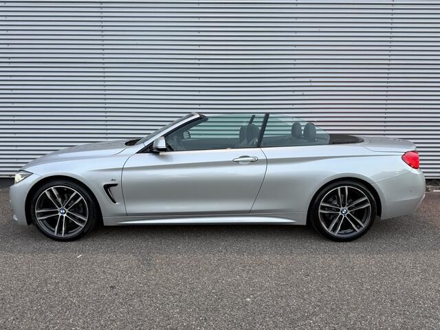 BMW 4-SERIE Cabrio 420i High Exec. M-sport Facelift NAP Dealer OH H&K HUD Leer 19"