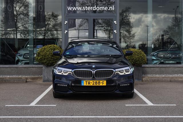 BMW 5-SERIE 520d EDE High Executive M Sport pakket l LED Adaptief l Navigatie Professional l Airodynamica pakket l Driving Assistance l PDC l Ambiance verlichting l Warmte Comfort pakket l Electrisch verwarmde voorstoelen l Camera l Alarm klasse 3 l Comfortstoelen vo