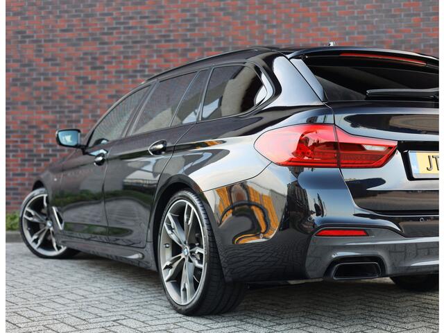 BMW 5-SERIE Touring M550d xDrive | Pano - Trekhaak - HUD