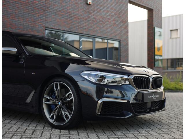 BMW 5-SERIE Touring M550d xDrive | Pano - Trekhaak - HUD