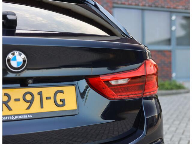 BMW 5-SERIE Touring M550d xDrive | Pano - Trekhaak - HUD
