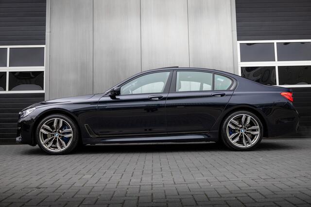 BMW 7-SERIE 750i 449 pk xDrive M-Sportpakket / NL-Auto/ Laser/ Head-Up/ 360-Camera/ Soft-Close/ Keyless/ Nappa-Leder/ Adap.Cruise/ Schuifdak/ Luchtvering/ Camera/ 20'' LMV