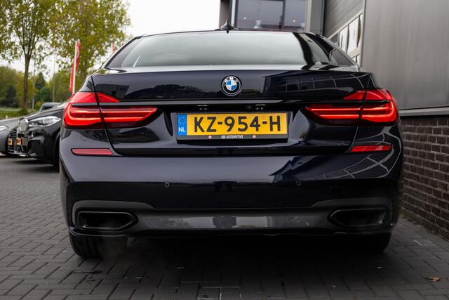 BMW 7-SERIE 750i 449 pk xDrive M-Sportpakket / NL-Auto/ Laser/ Head-Up/ 360-Camera/ Soft-Close/ Keyless/ Nappa-Leder/ Adap.Cruise/ Schuifdak/ Luchtvering/ Camera/ 20'' LMV